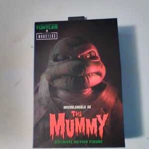 Teenage Mutant Ninja Turtles x Monsters Michelangelo as The Mummy Action Figure